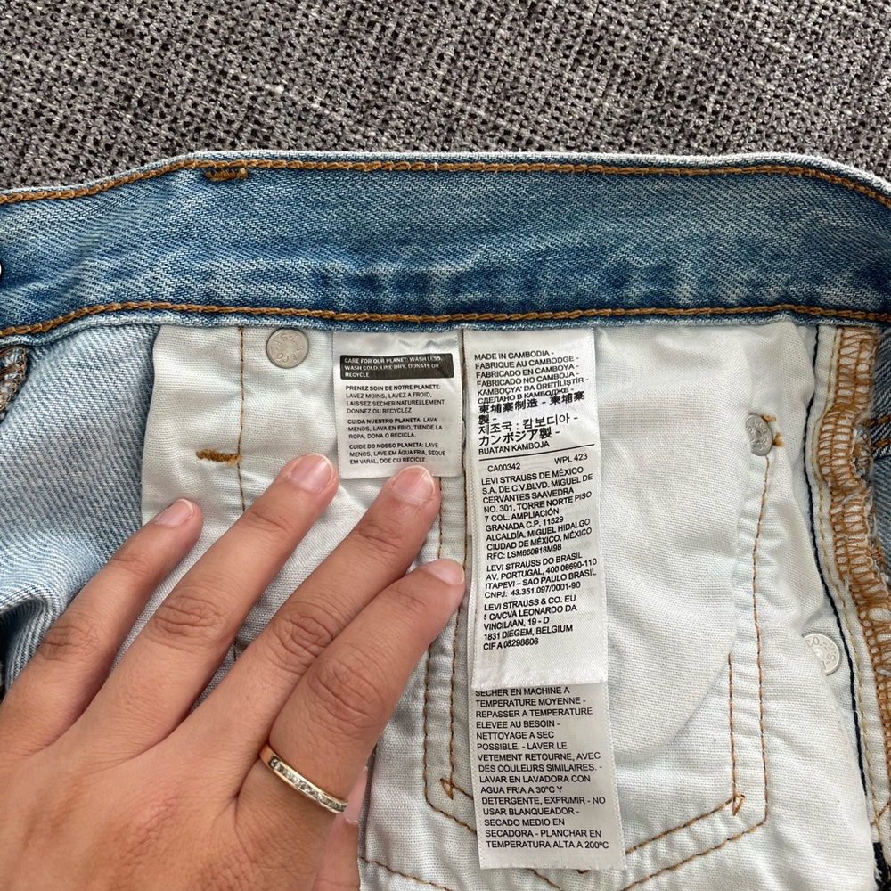 Levi’s Distressed Light Blue Denim Shorts - Picture 5 of 6